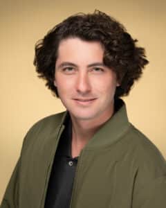 Top Three Benefits of Professional Headshots 1 Actor Headshots of Tyler Hill showcasing a friendly look, with a warm smile and approachable demeanor.