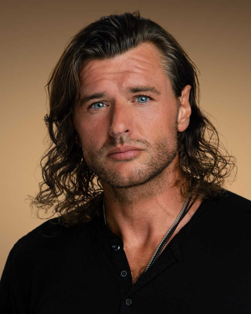 Actor Andy Brodhag’s headshot with cinematic lighting, captured by Art of Portraits in Newport Beach.