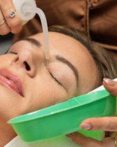 Elegant spa interior at AVA Permanent Makeup & Spa with client consultation