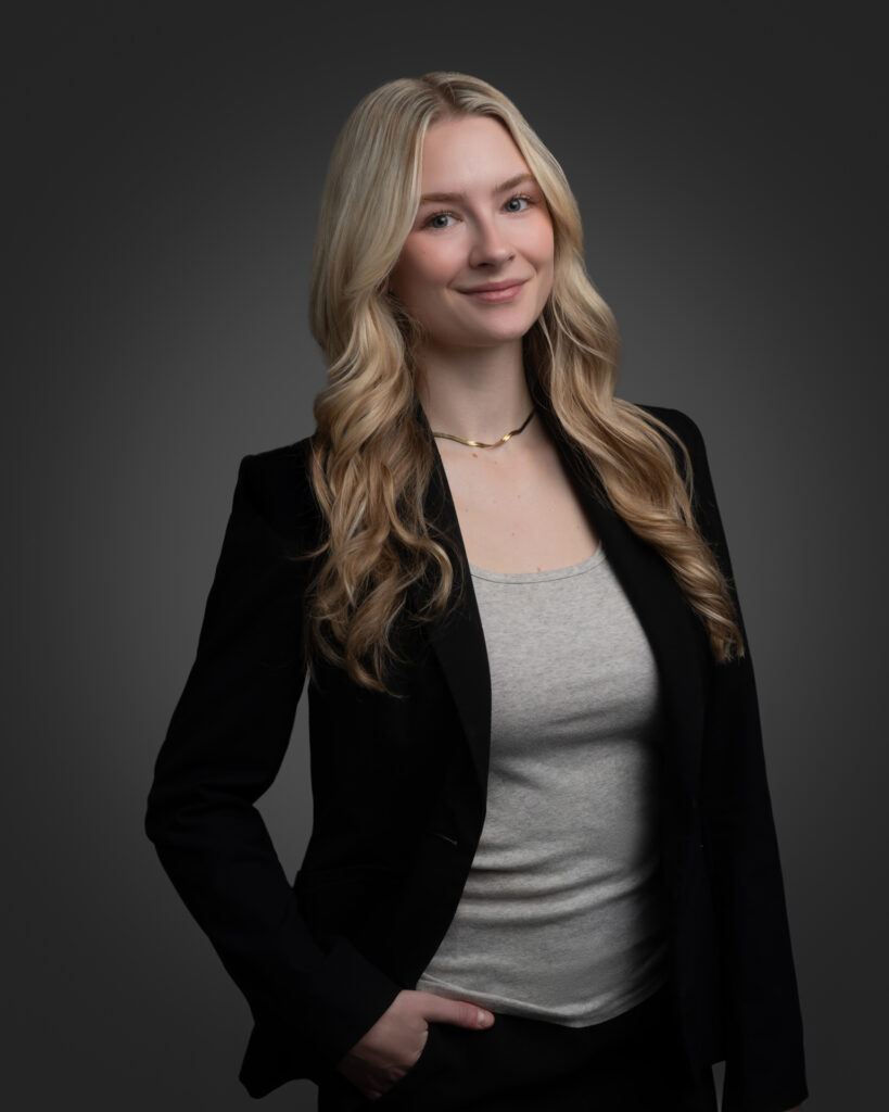 Professional headshot of an individual taken in Edmonton portrait studio by Art of Portraits, featuring clean lighting and a confident pose.
