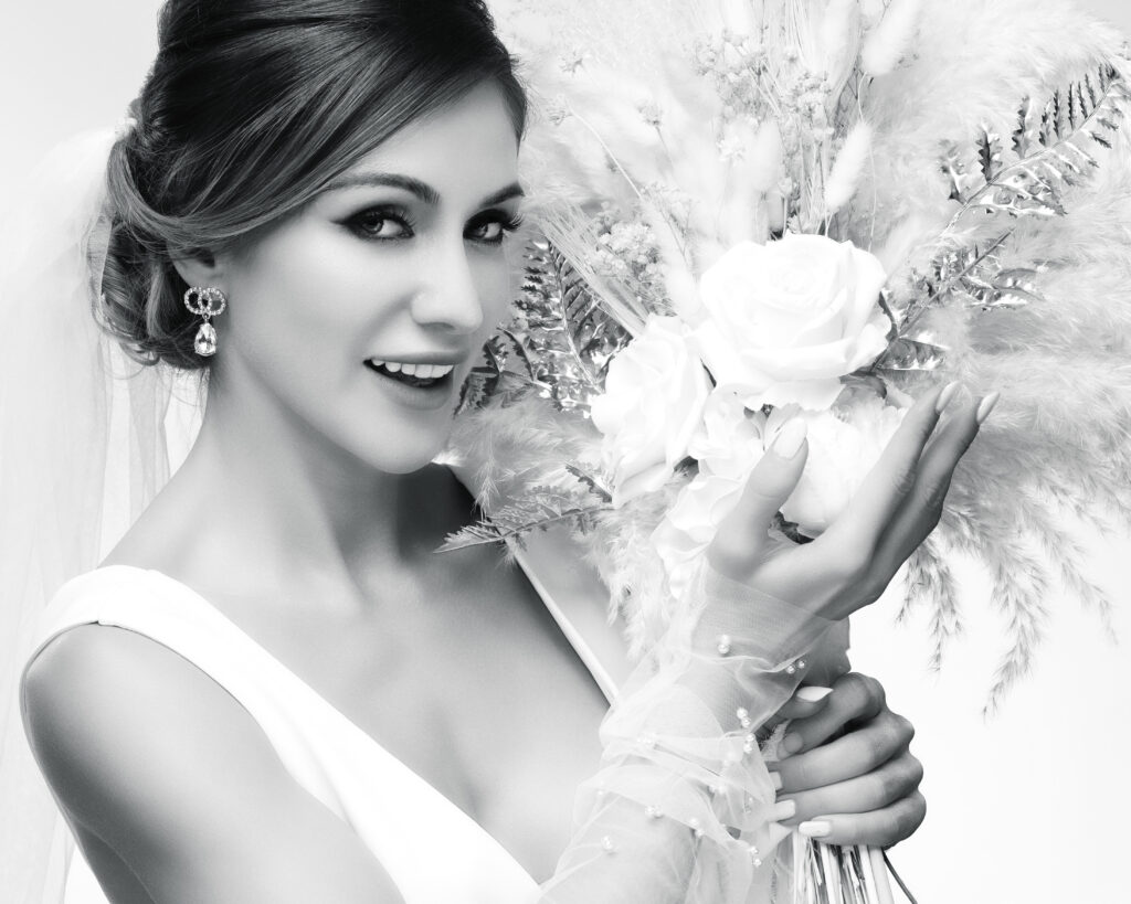 Bridal portrait in white dress, black and white photo by Art of Portraits studio in Newport Beach