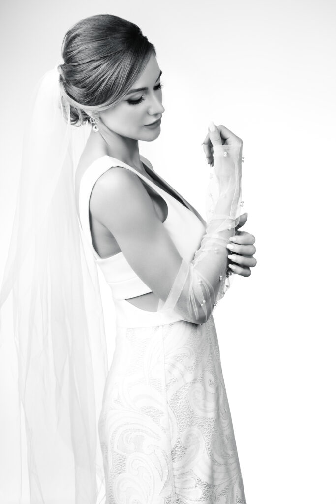 Bridal portrait in white dress, black and white photo by Art of Portraits studio in Newport Beach