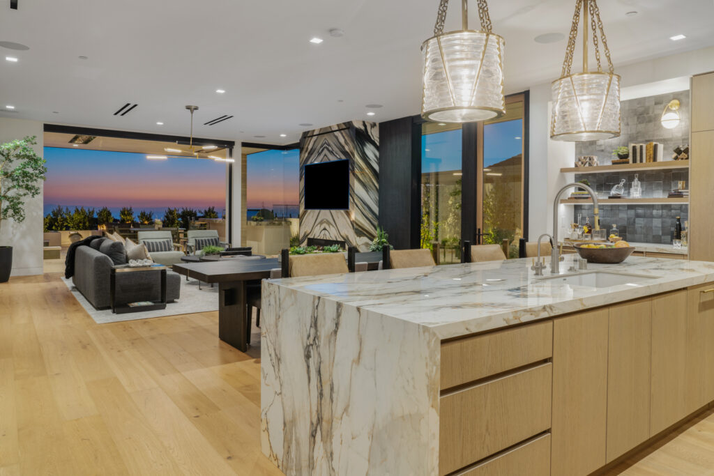 Luxurious kitchen and dining room in Orange County, CA—captured by Art of Portraits® for premium real estate photography and upscale property listings.