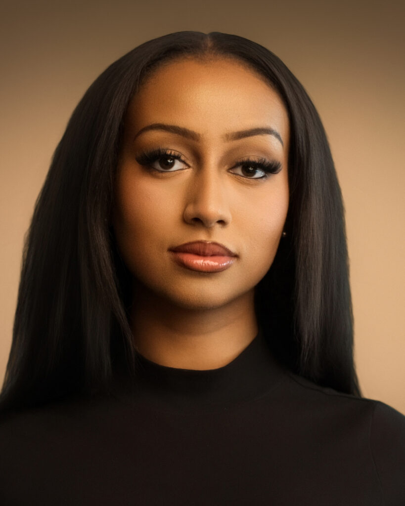 Professional headshot of Tien Vo captured at Edmonton Portrait Studio with warm tone lighting by Art of Portraits