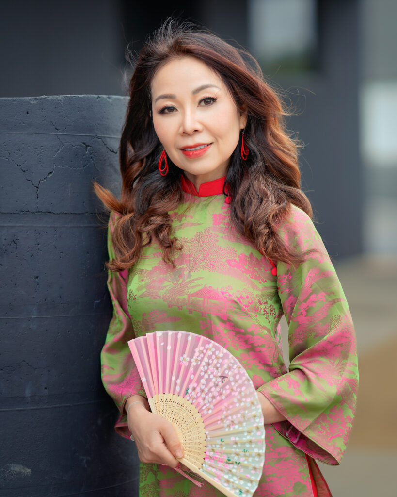 Tammy Le outdoor lifestyle portrait celebrating Year of the Snake with symbolic styling
