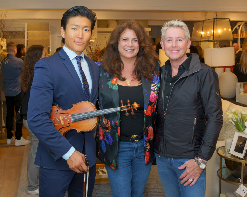 A group with Violinist at the CDM Home Tour Barclay Interior VIP event