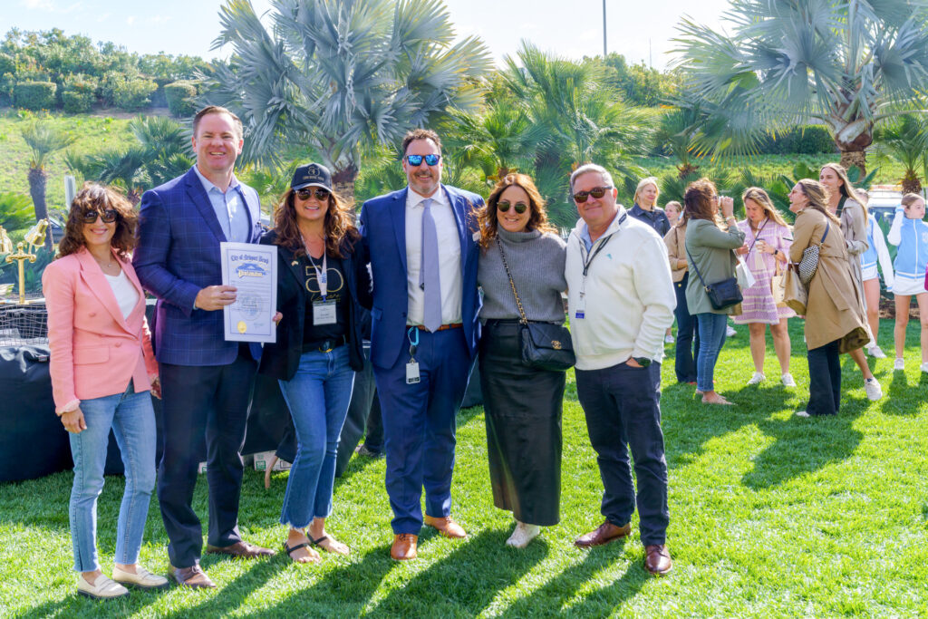 A group photo with Newport Beach Mayor and CDM High School Principle